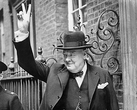 Churchill showing the infamous 'Victory sign'/'V-sign'